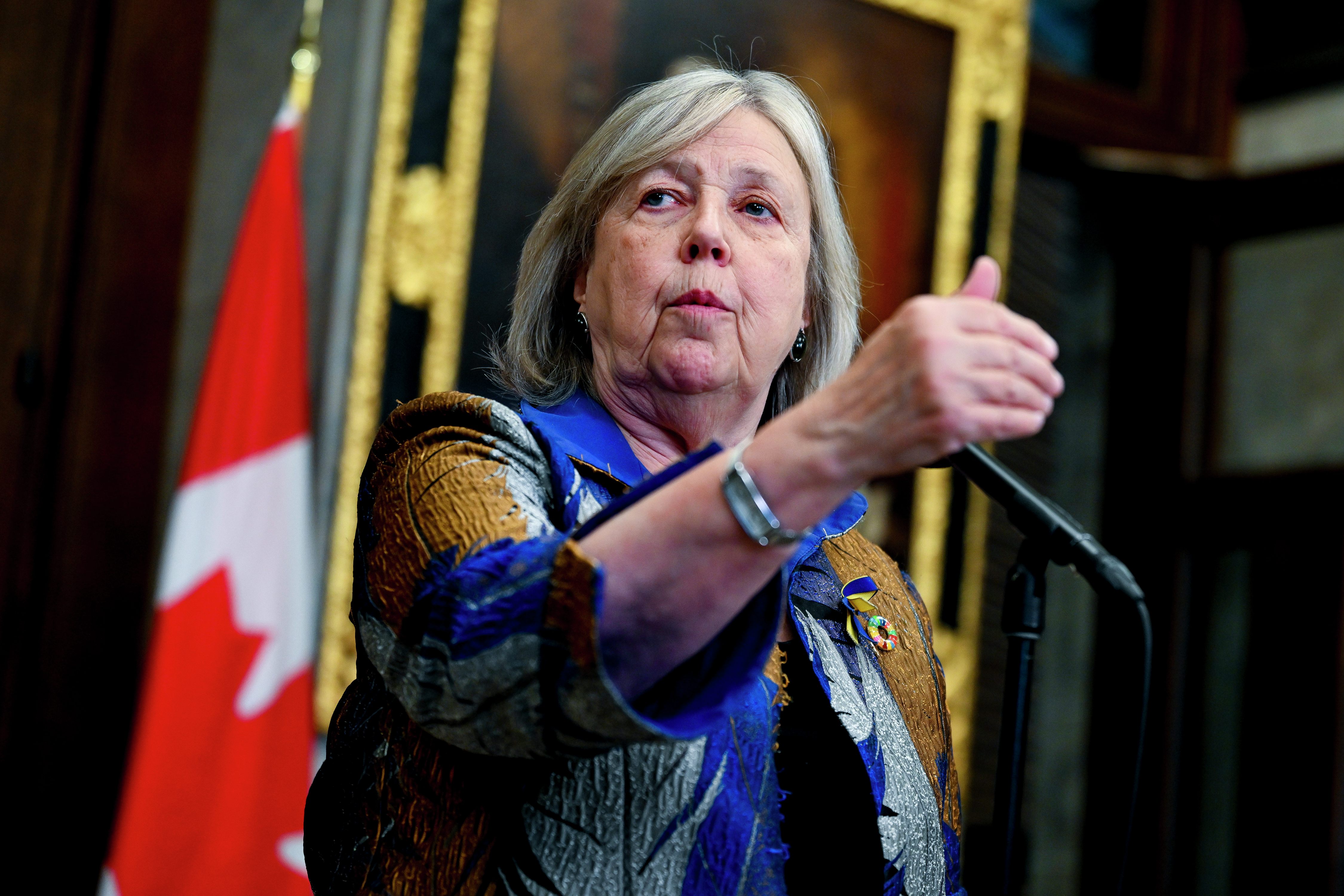 Green party leader Elizabeth May discusses petition to remove Pete Hoekstra as ambassador, tackling trade conflicts episode artwork