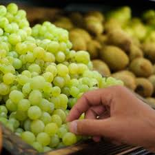 Is it okay to sample grapes before buying them?