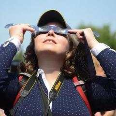 What should you do with the eclipse glasses?