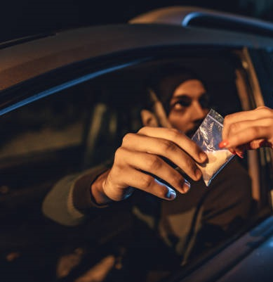 Residents of a downtown low-income city-run building complaining of drug dealing