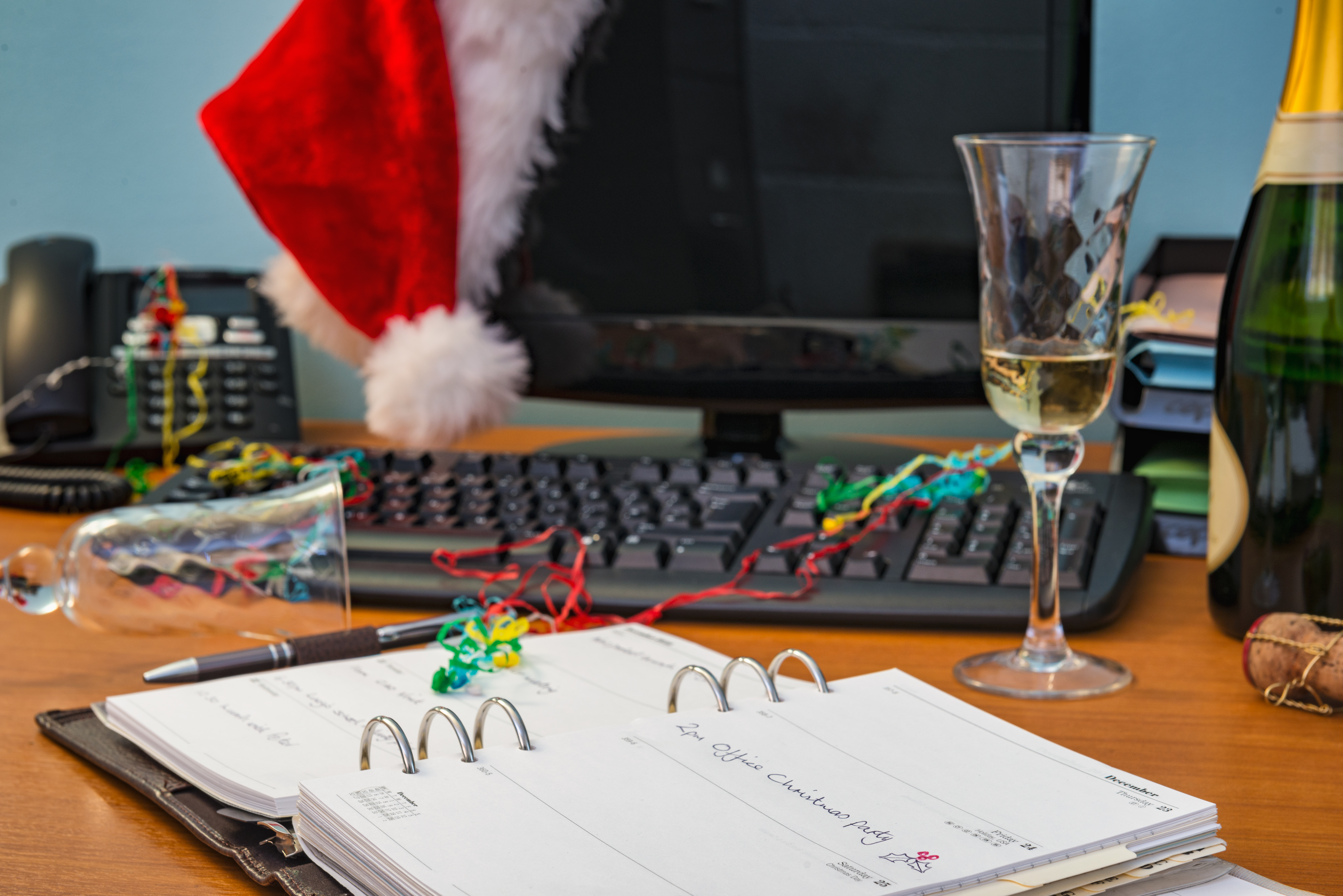 What is proper etiquette for an office holiday party?