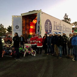 Helix Electic Makes A Splash On Day 1 of KLUC Toy Drive