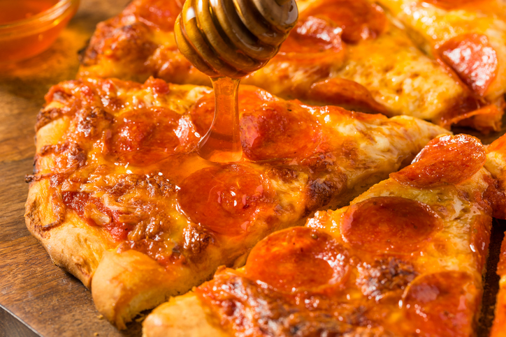 Move over pineapple, spicy honey is becoming the next polarizing pizza topping