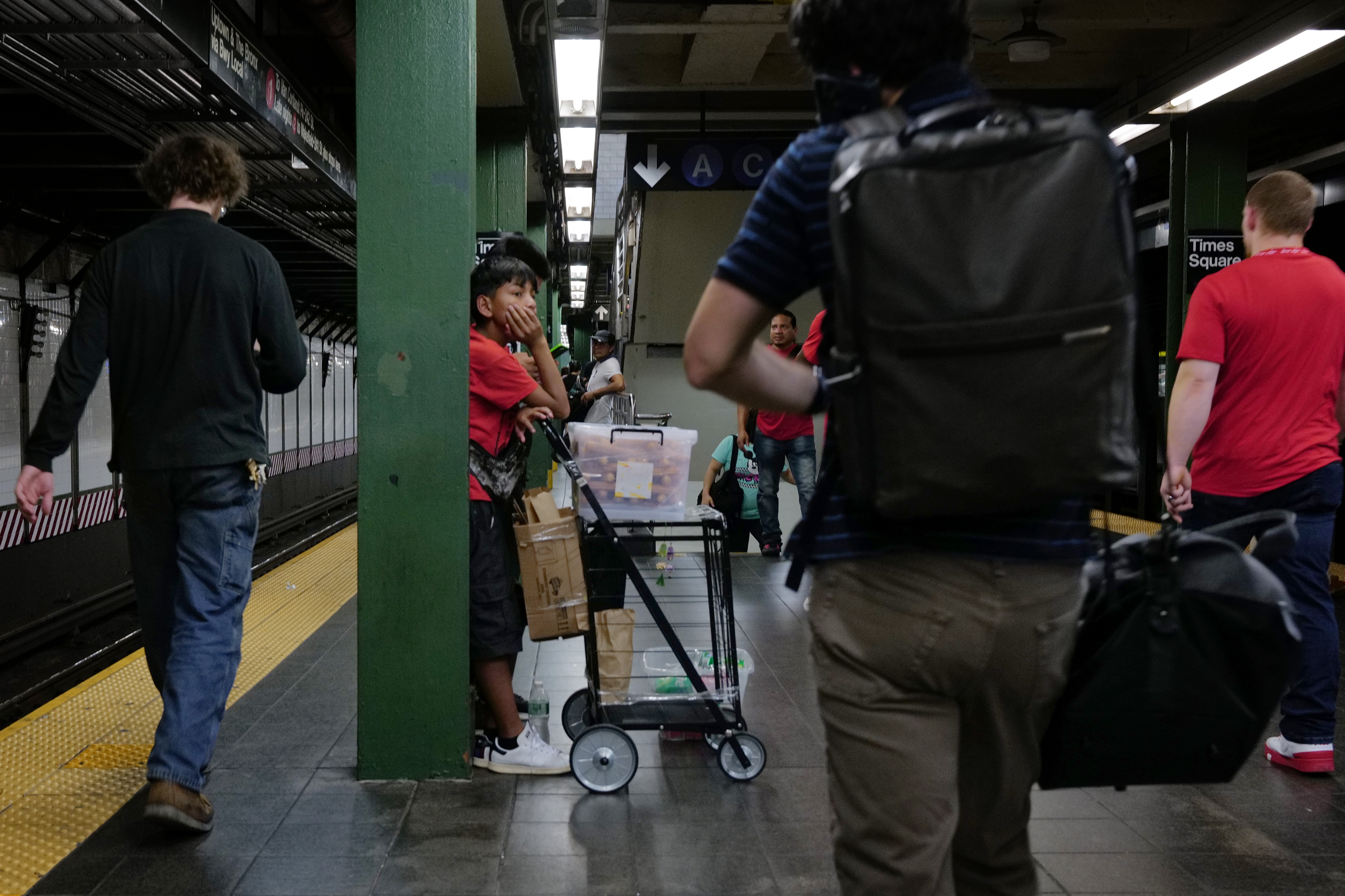 NEWSLINE: Why are so many migrant kids selling candy on the subway?