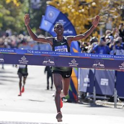 Winners Cross Finish Line At 48th NYC Marathon