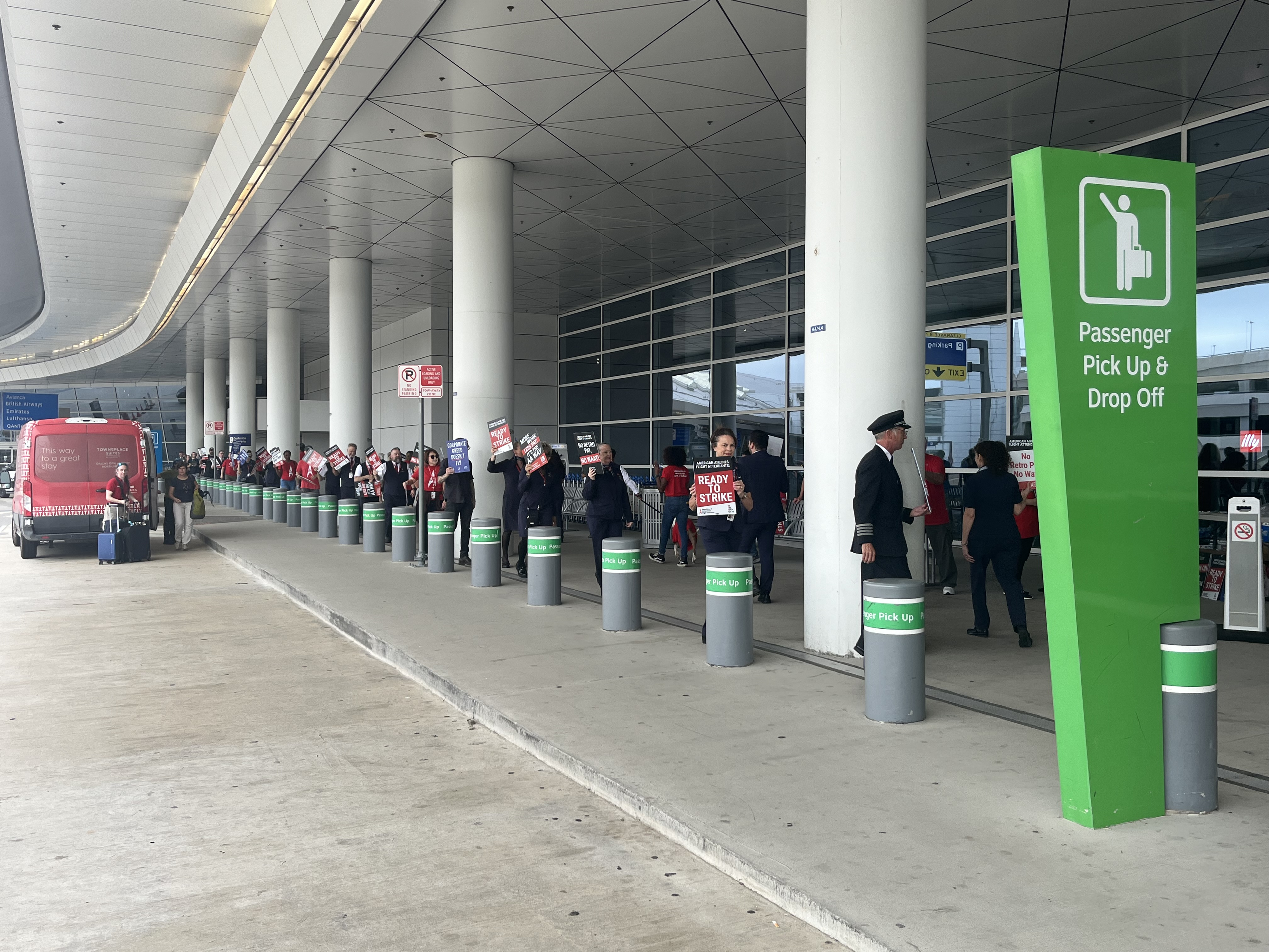 Flight attendants picket outside DFW Airport as they seek release from mediation