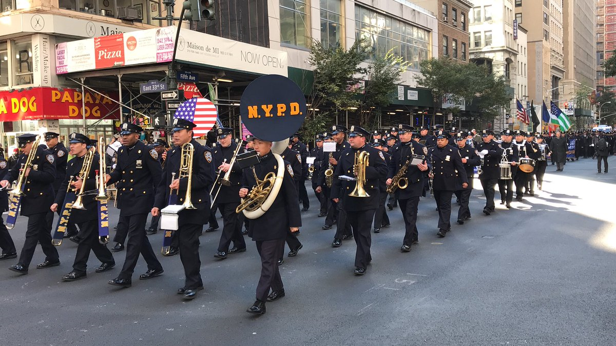 Crowds Bundle Up For NYC Veterans Day Parade