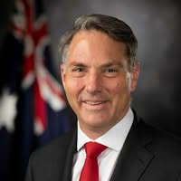 Richard Marle's chief of staff launches legal action.