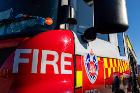 Urgent search underway for two people missing after house fire