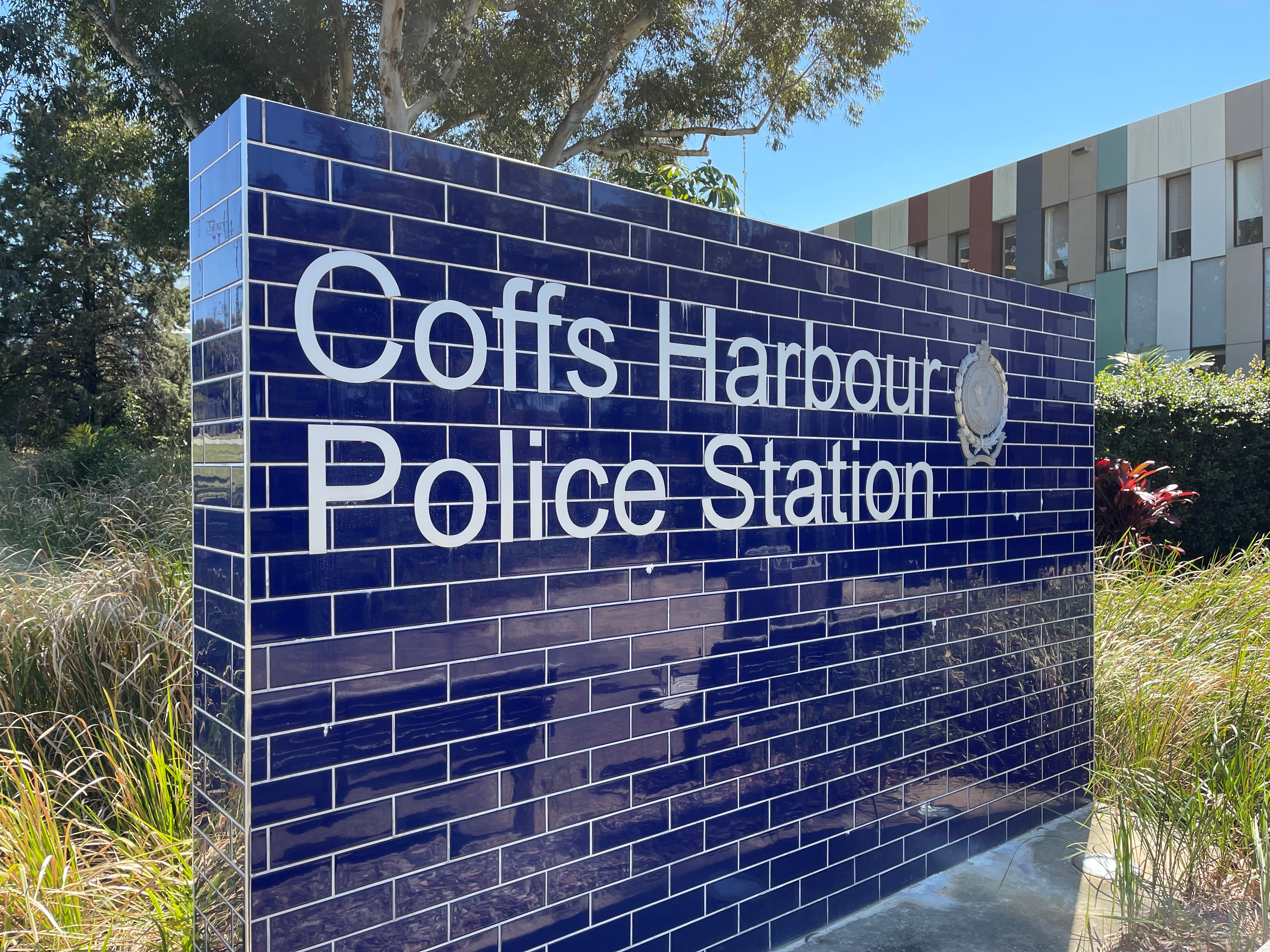 Protesters arrested on a rooftop in Coffs Harbour