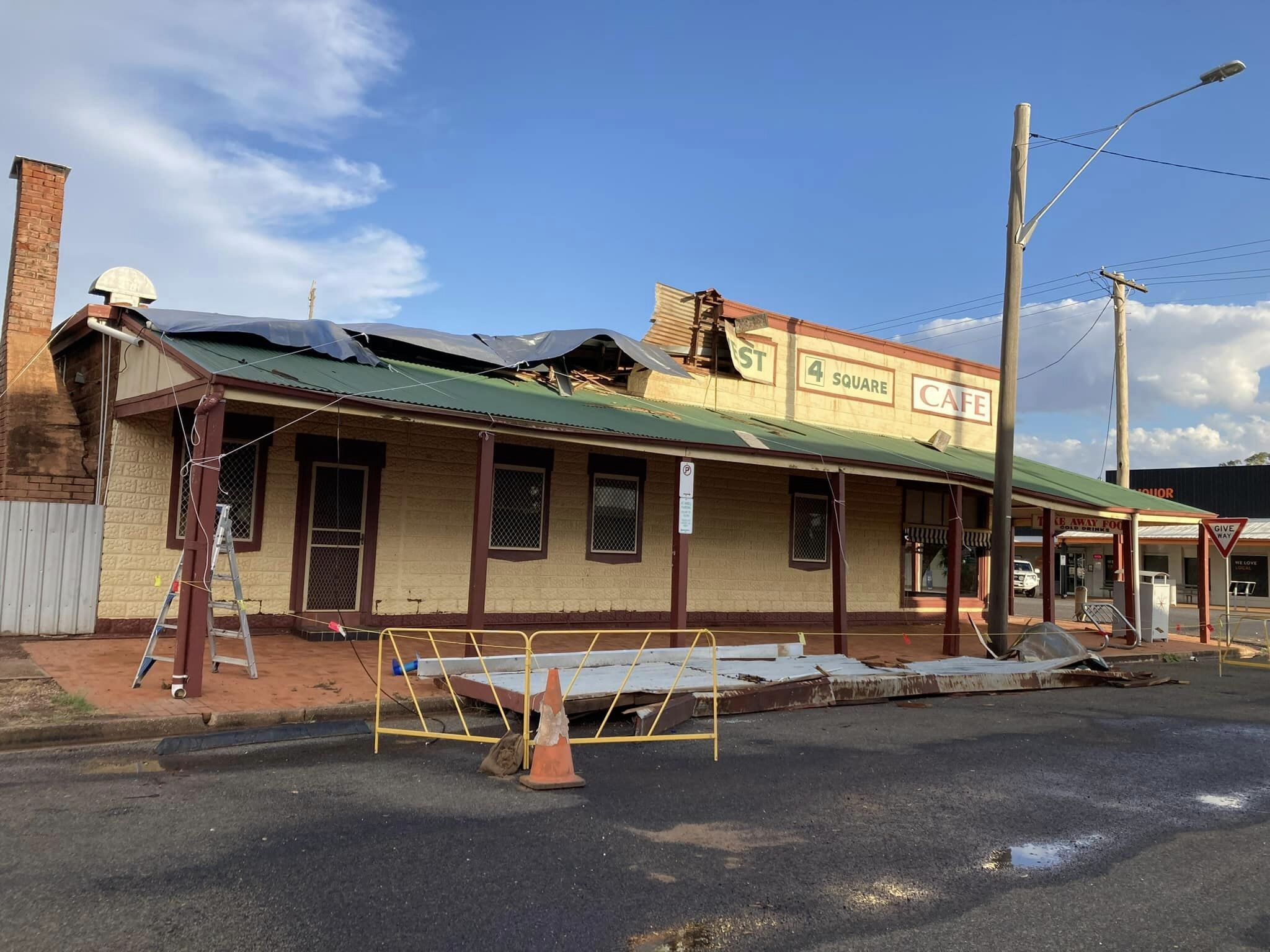 Wild winds tear off pub roof, bring down trees and powerlines cover image