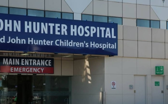 Man attacked by shark remains in hospital in Newcastle 