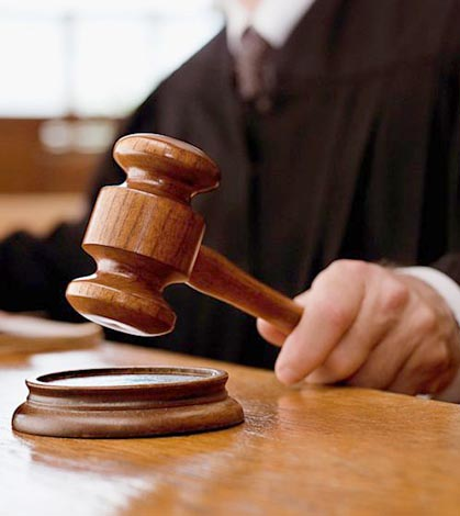 A Cooktown man shot five times while suffering psychotic episode sues