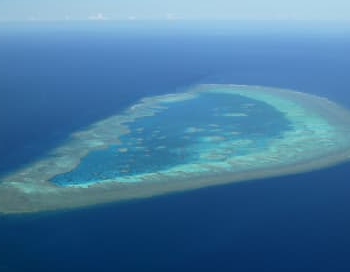Boat sinks and leaves four stranded off Gladstone's coast