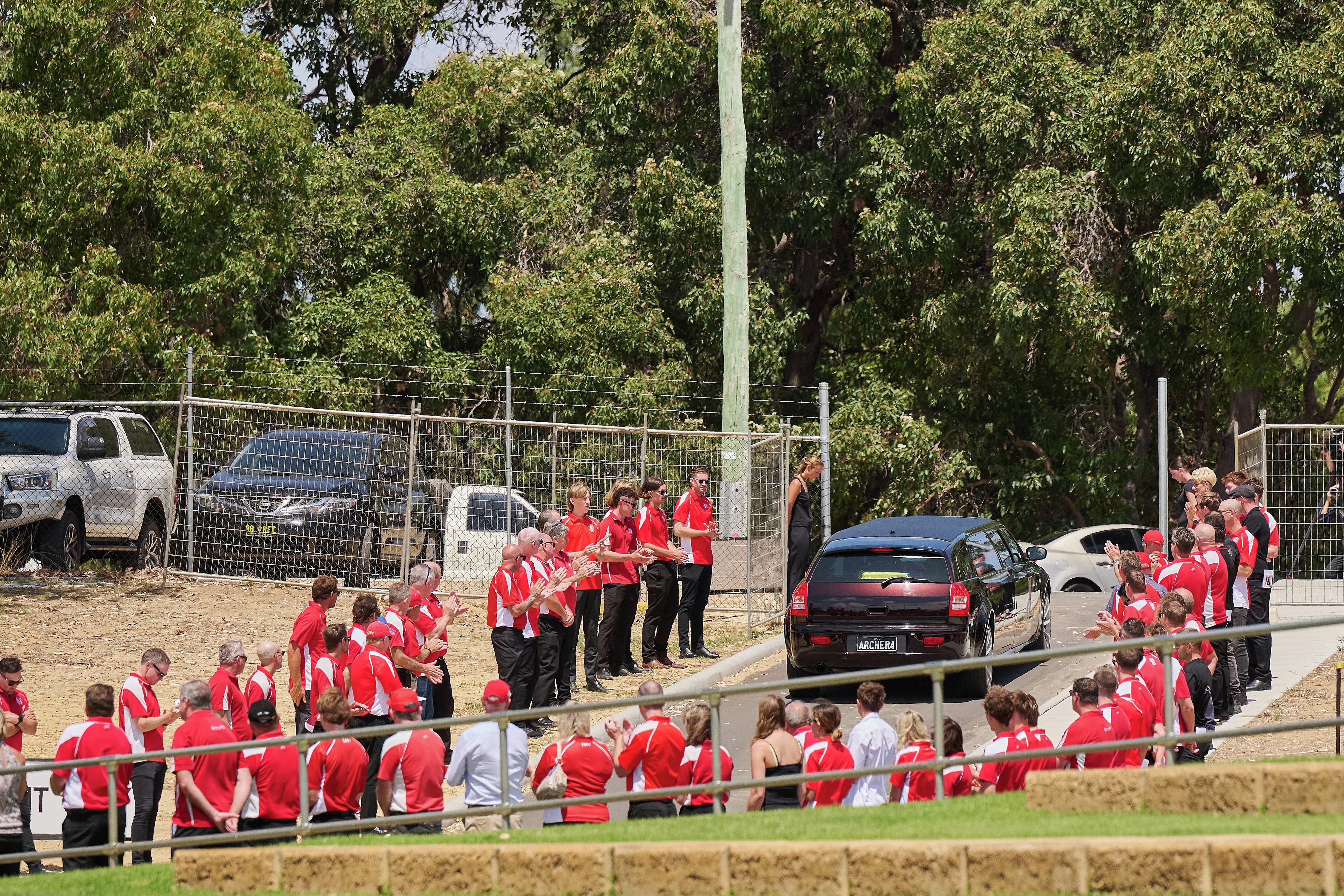 Hundreds gather to farewell Eagles Premiership player Adam Hunter