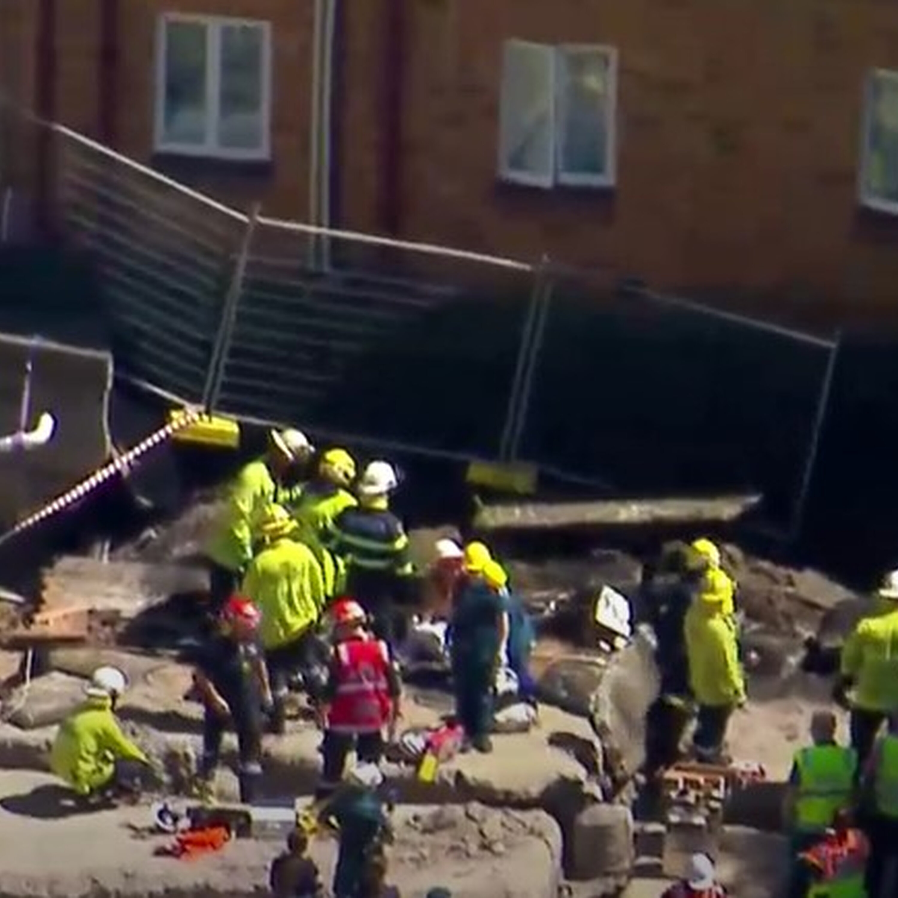 One dead, another injured in Brisbane wall collapse One dead, another injured in Brisbane wall collapse