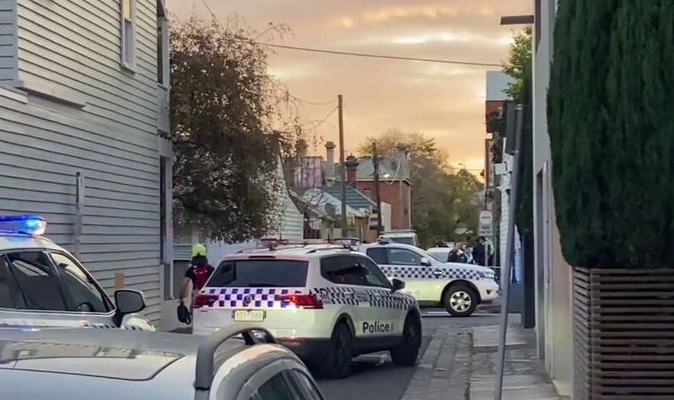 Woman shot dead after driving a car at police 