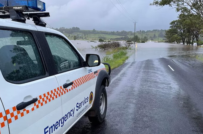 NSW floods isolate towns, claim life near Taree; AFL great Robert Walls remembered