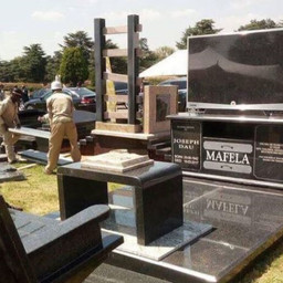 Lebohang Khitsane makes cutting edge tombstones (fancy a QR code on yours?)