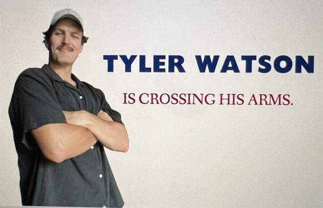 Tyler Watson is crossing his arms