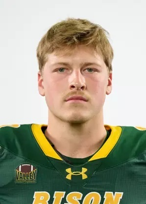 Derek Hanson with Cole Payton after UND Win