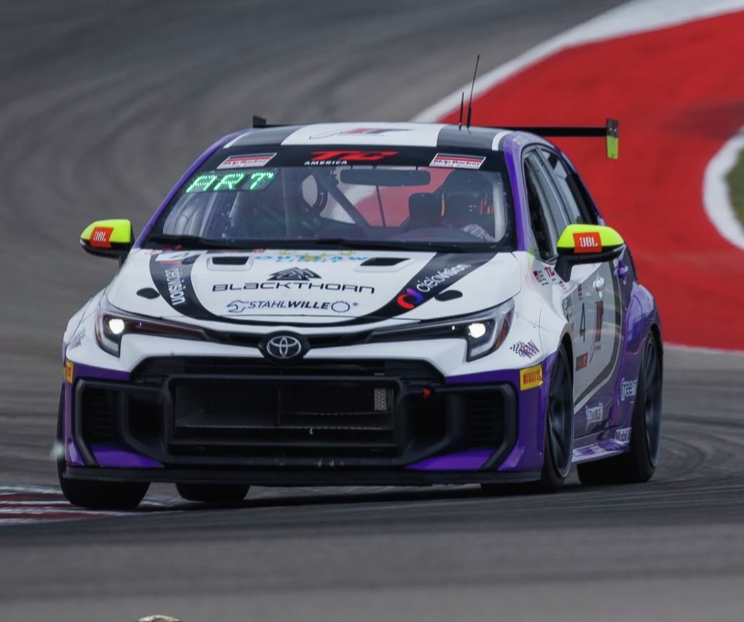Otto talks with Touring Car America driver Braydon Arthur