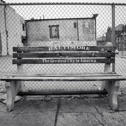 What’s With Those “Greatest City In America” Benches?