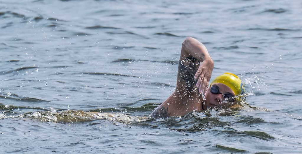 Katie Pumphrey aced a historic swim into Baltimore's harbor. Now she wants others to join her.