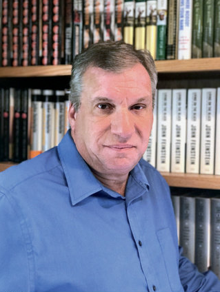 In 'Raise a Fist...' John Feinstein probes racial inequity in pro sports