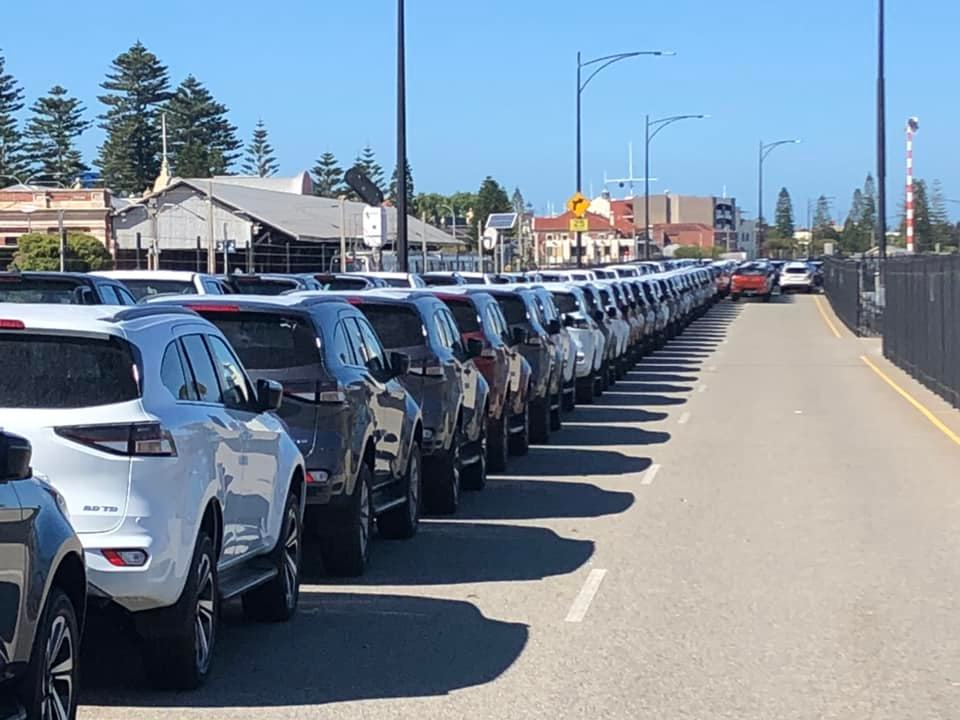 Influx of imported cars shuts down Peter Hughes Drive
