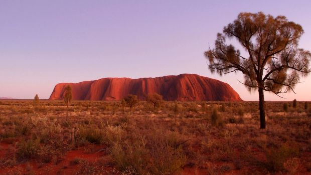 Custodians of Uluru will meet today to consider a permanent ban on climbing the rock