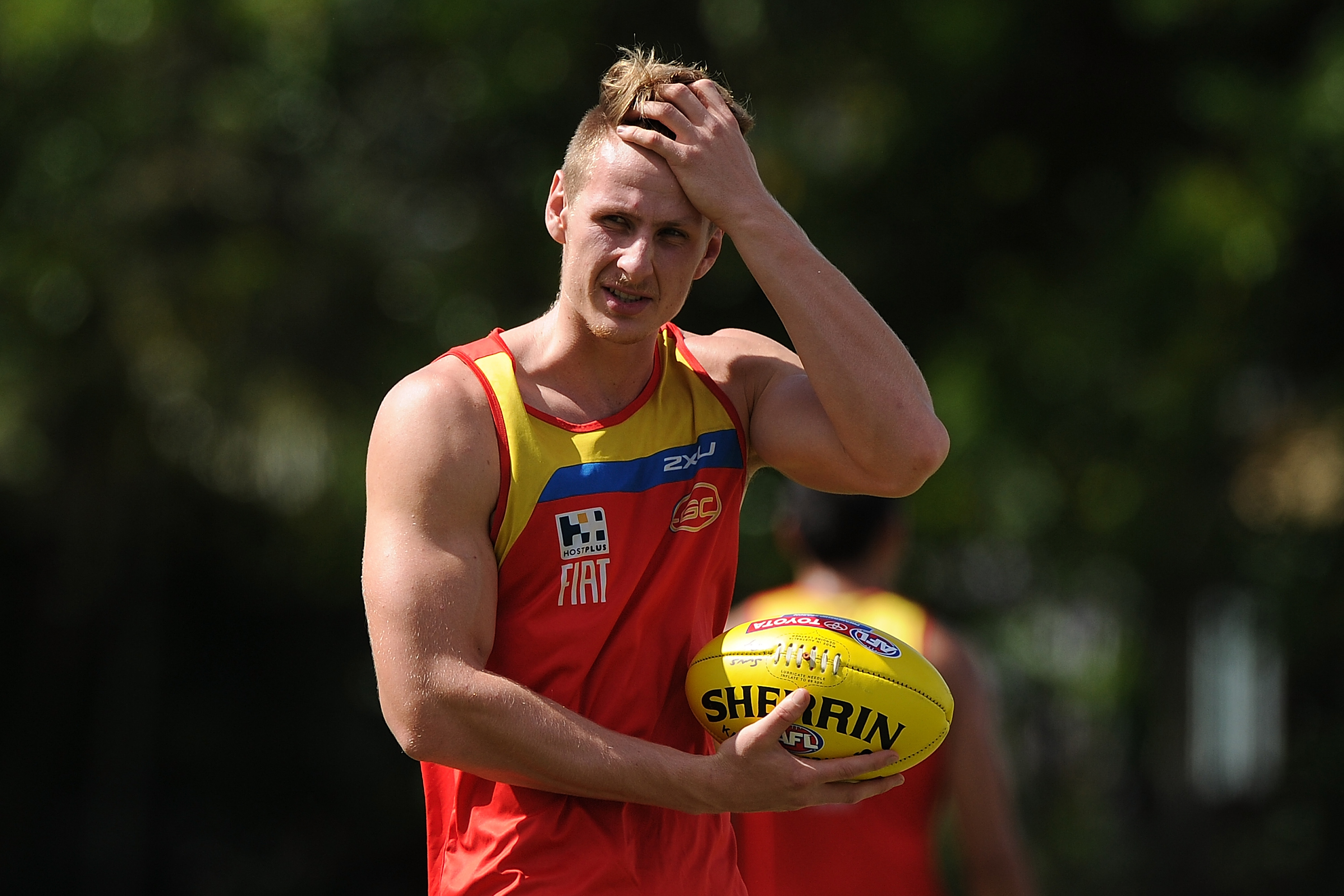 Former AFL player vows to fulfil tattoo bet after Carlton's shock loss