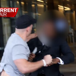 Neo-Nazi filmed punching Channel Nine security guard in the head