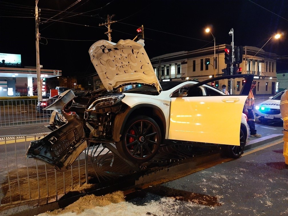 Drink-driver and passenger 'very lucky' after Mercedes slams into tram barrier