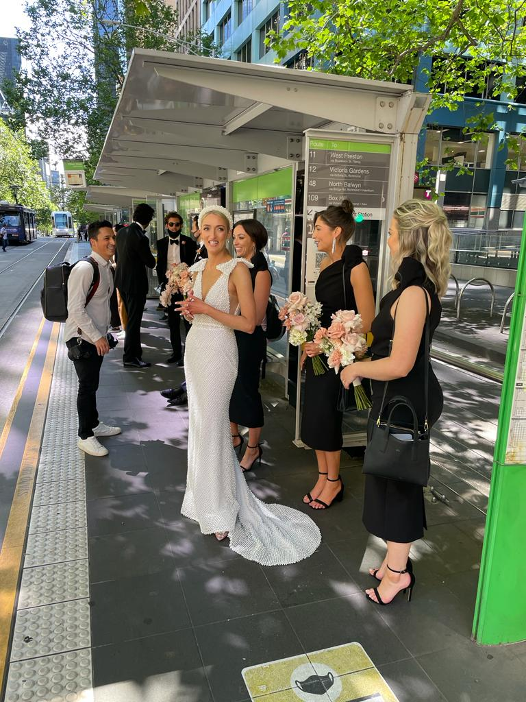 'Didn't think twice': Couple jump on a tram to get to their wedding on time after traffic nightmare