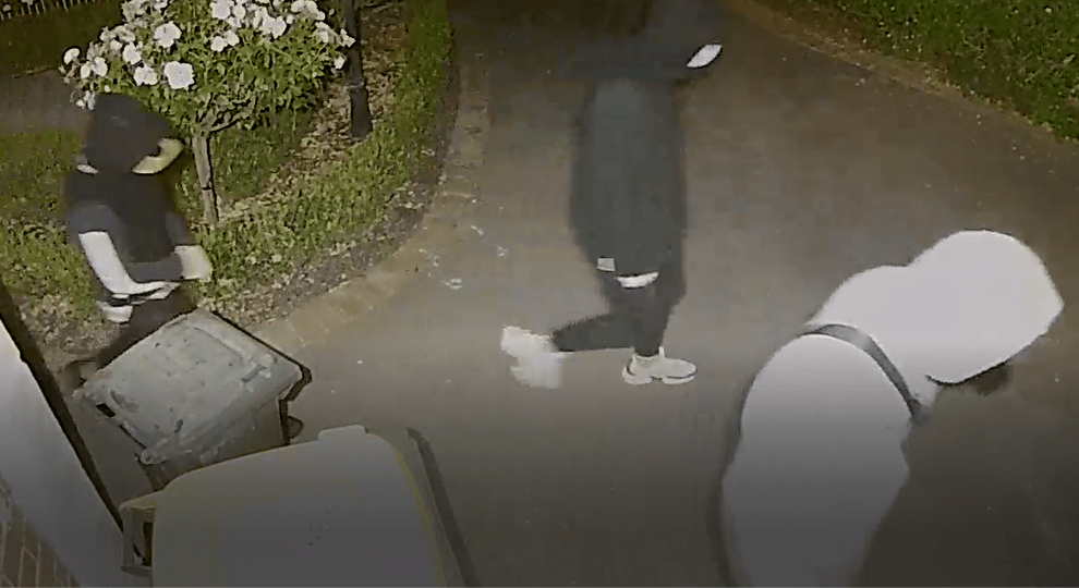 Police hunt trio who drove stolen Mercedes straight through a Williamstown garage door