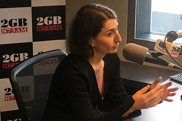Premier Gladys Berejiklian calls for migration halt
