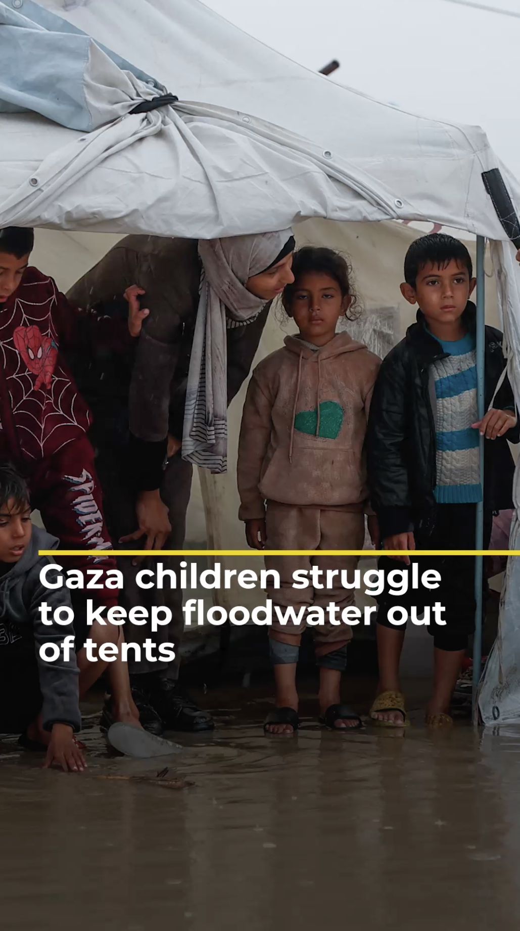 Desperate children in Gaza try to keep floodwater out of tents | AJ #shorts
