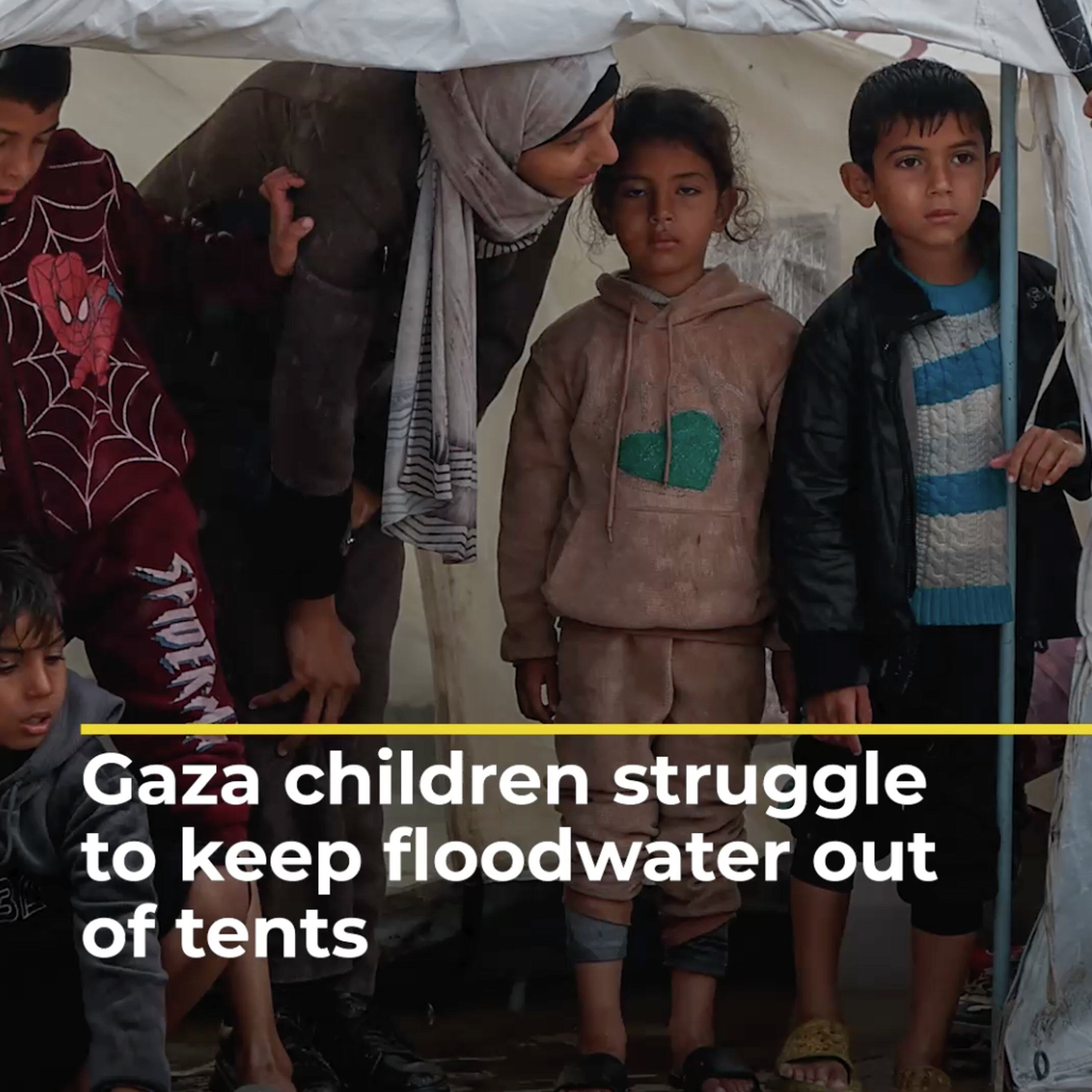 Desperate children in Gaza try to keep floodwater out of tents | AJ #shorts Desperate children in Gaza try to keep floodwater out of tents | AJ #shorts