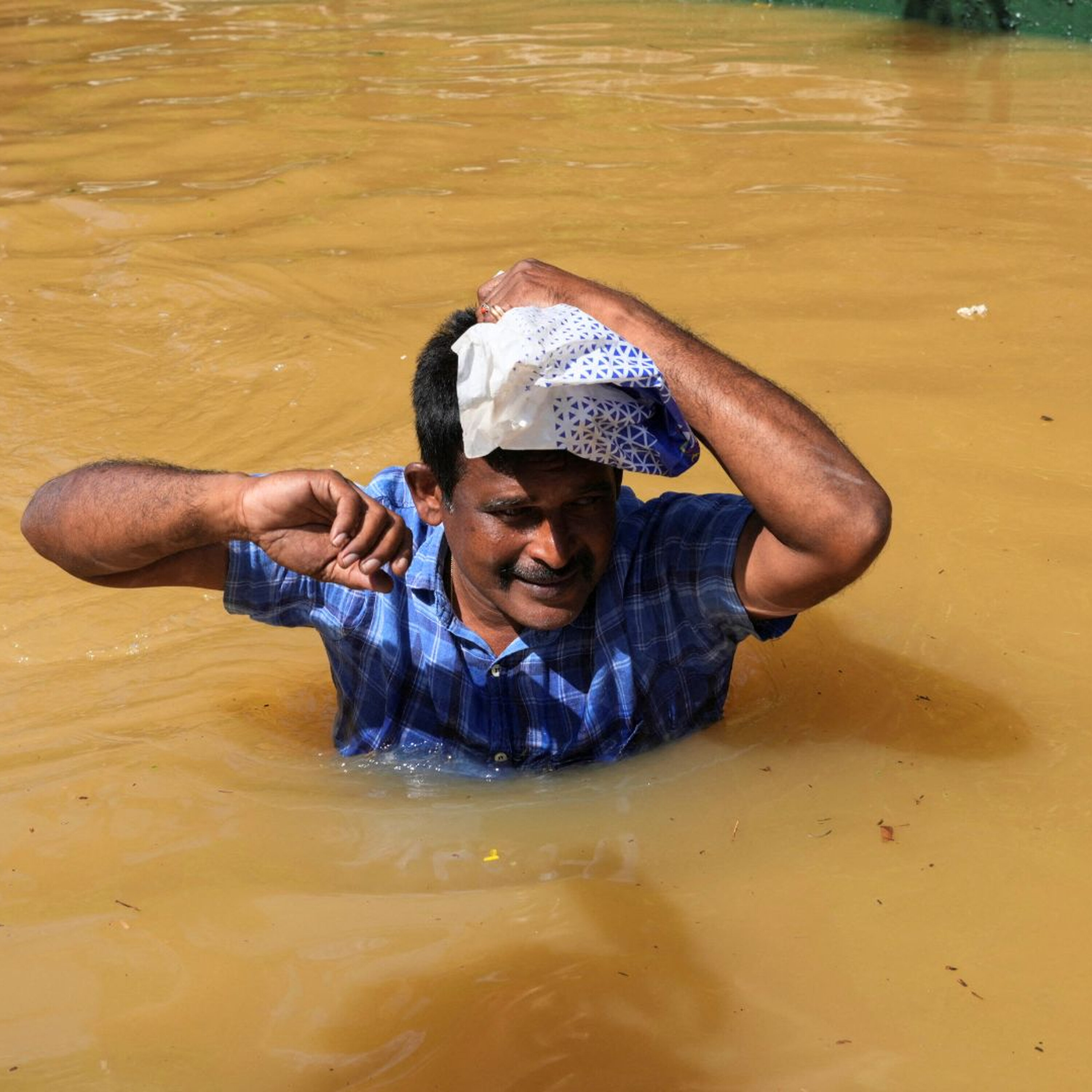 ‘Neighbourhoods buried under mud’: Sri Lanka floods death toll reaches 334 ‘Neighbourhoods buried under mud’: Sri Lanka floods death toll reaches 334