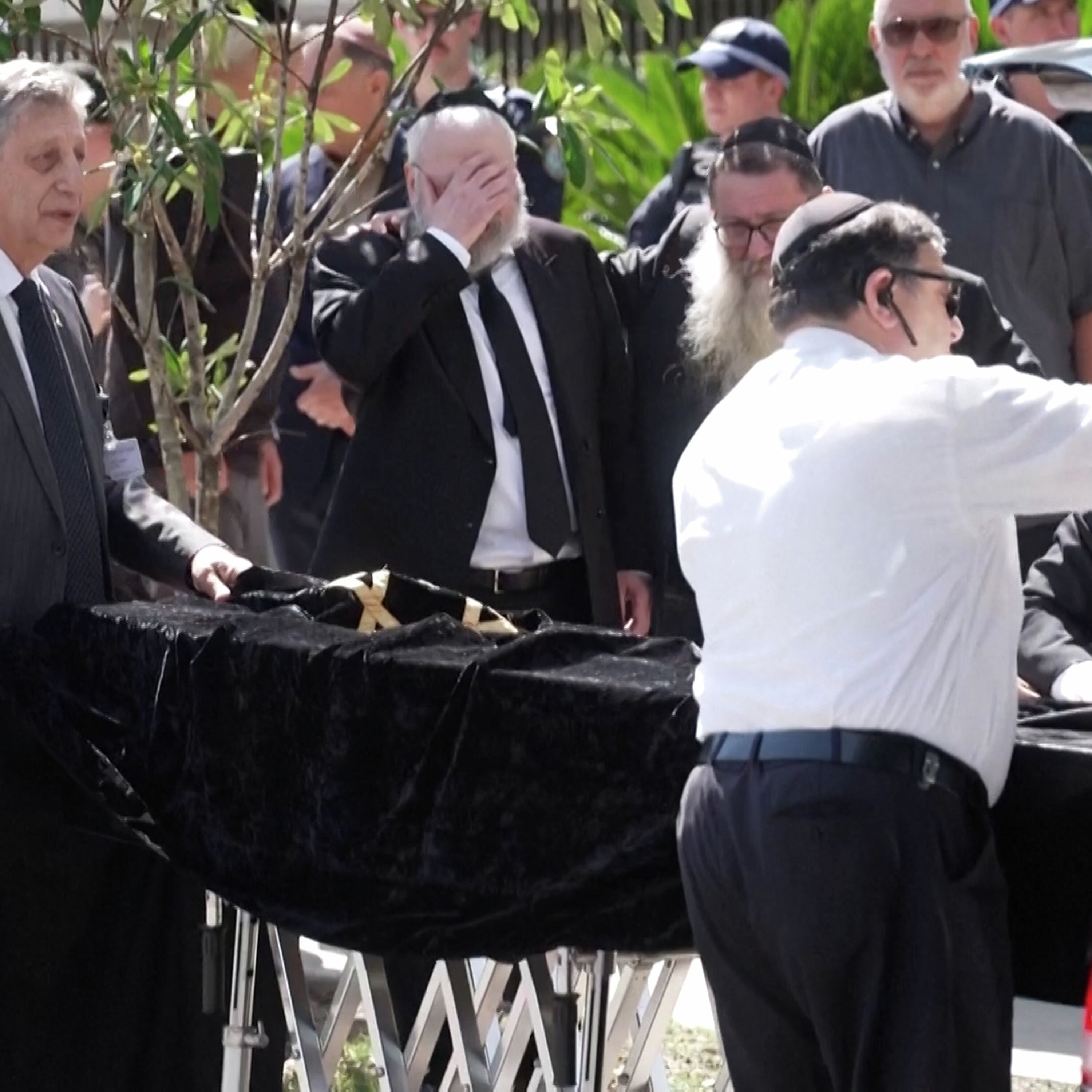 Mourners attend funeral of rabbi killed in Bondi shooting Mourners attend funeral of rabbi killed in Bondi shooting