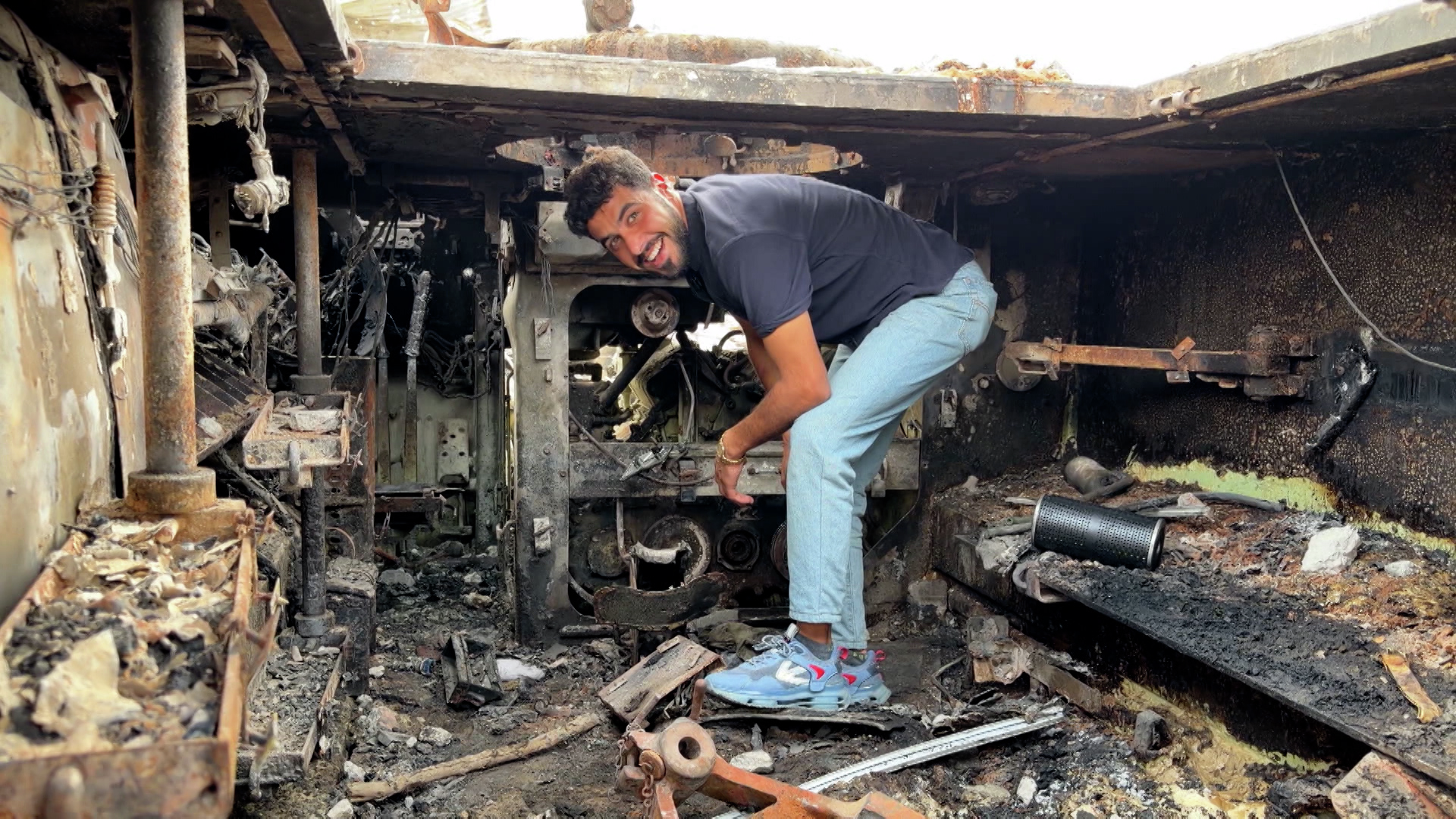 Palestinians use abandoned Israeli vehicle to help supply water in Gaza