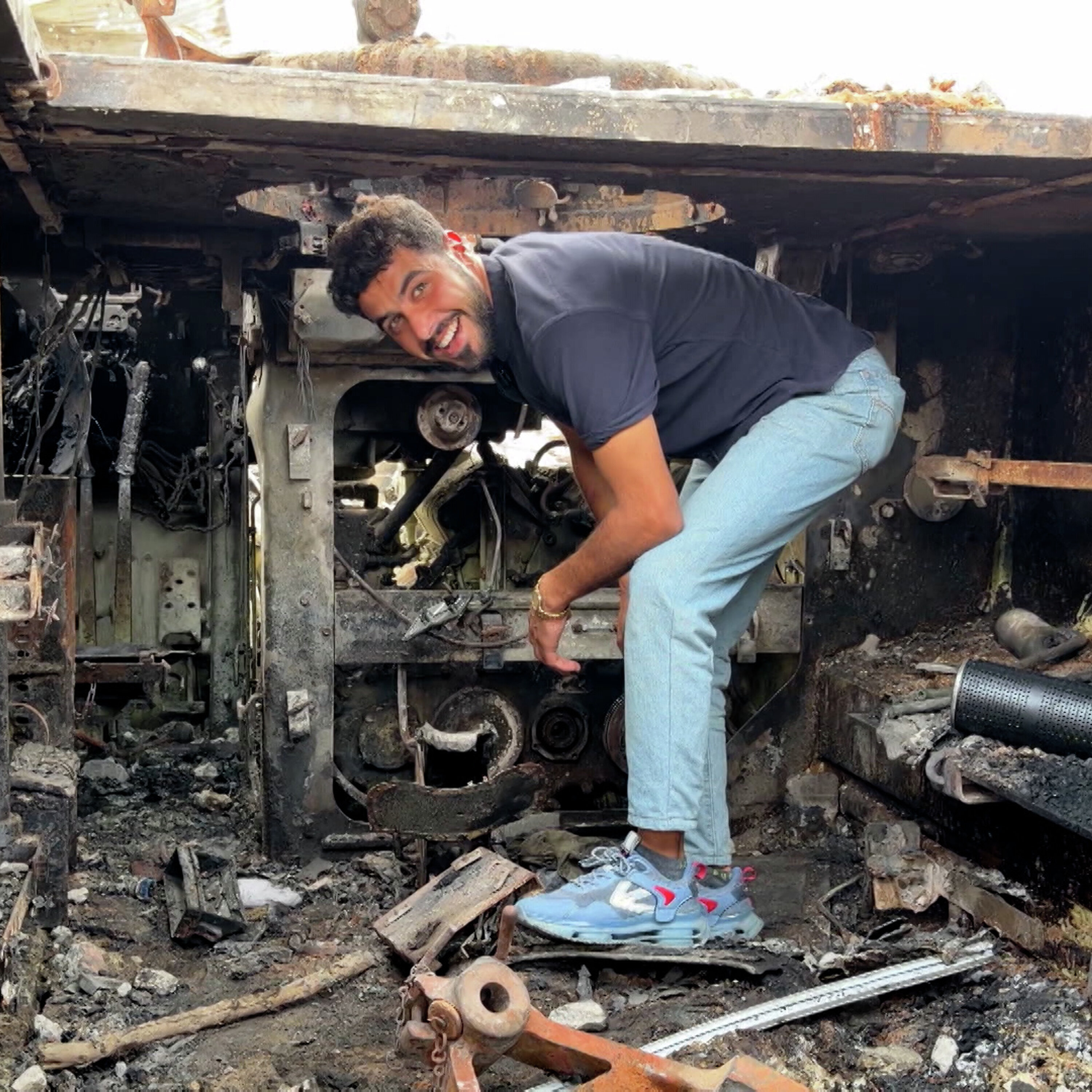 Palestinians use abandoned Israeli vehicle to help supply water in Gaza Palestinians use abandoned Israeli vehicle to help supply water in Gaza