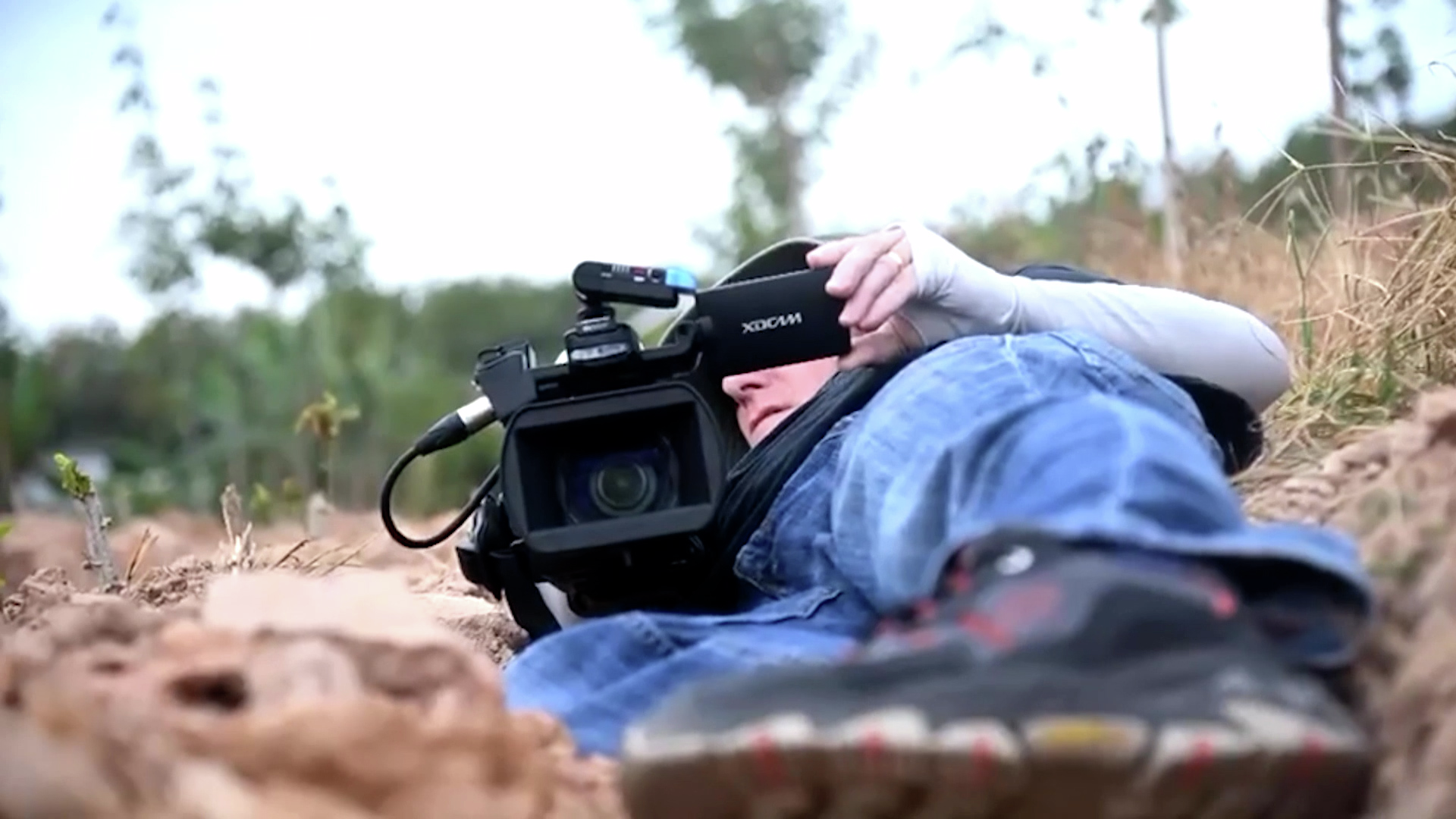 Al Jazeera crew takes cover from Thailand-Cambodia artillery duel