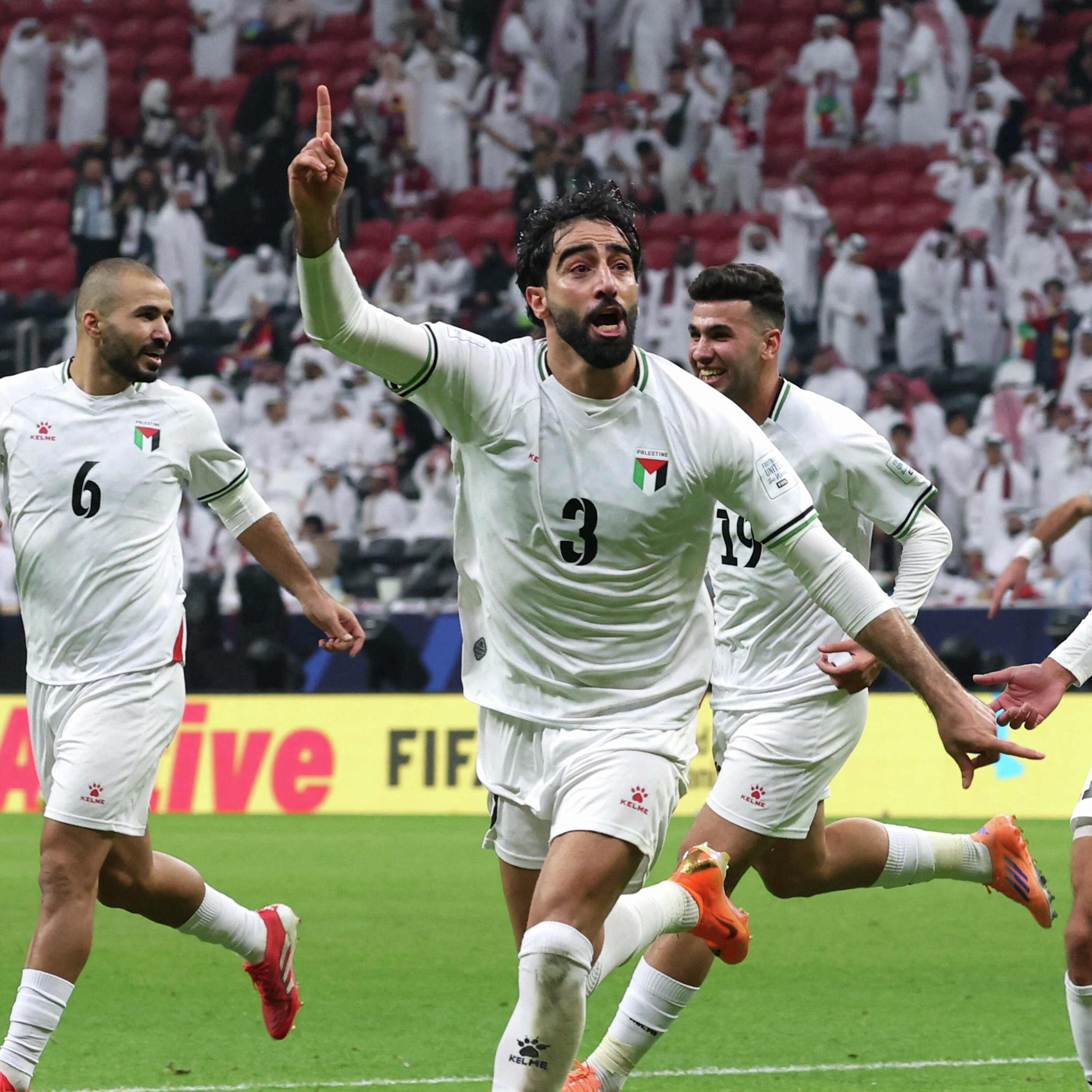 Palestine wins first match over Qatar at FIFA Arab Cup Palestine wins first match over Qatar at FIFA Arab Cup