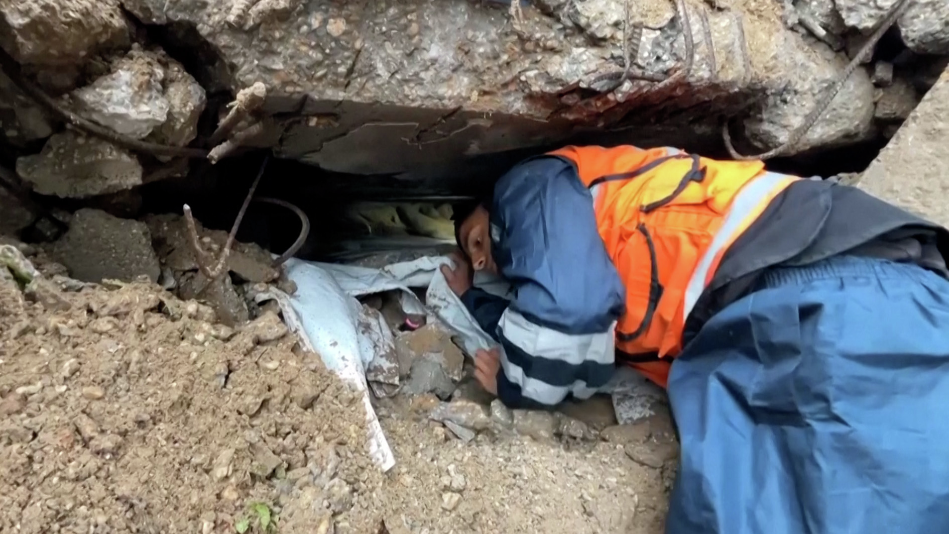 Rescuers in Gaza pull Palestinians out of buildings collapsed by Storm Byron