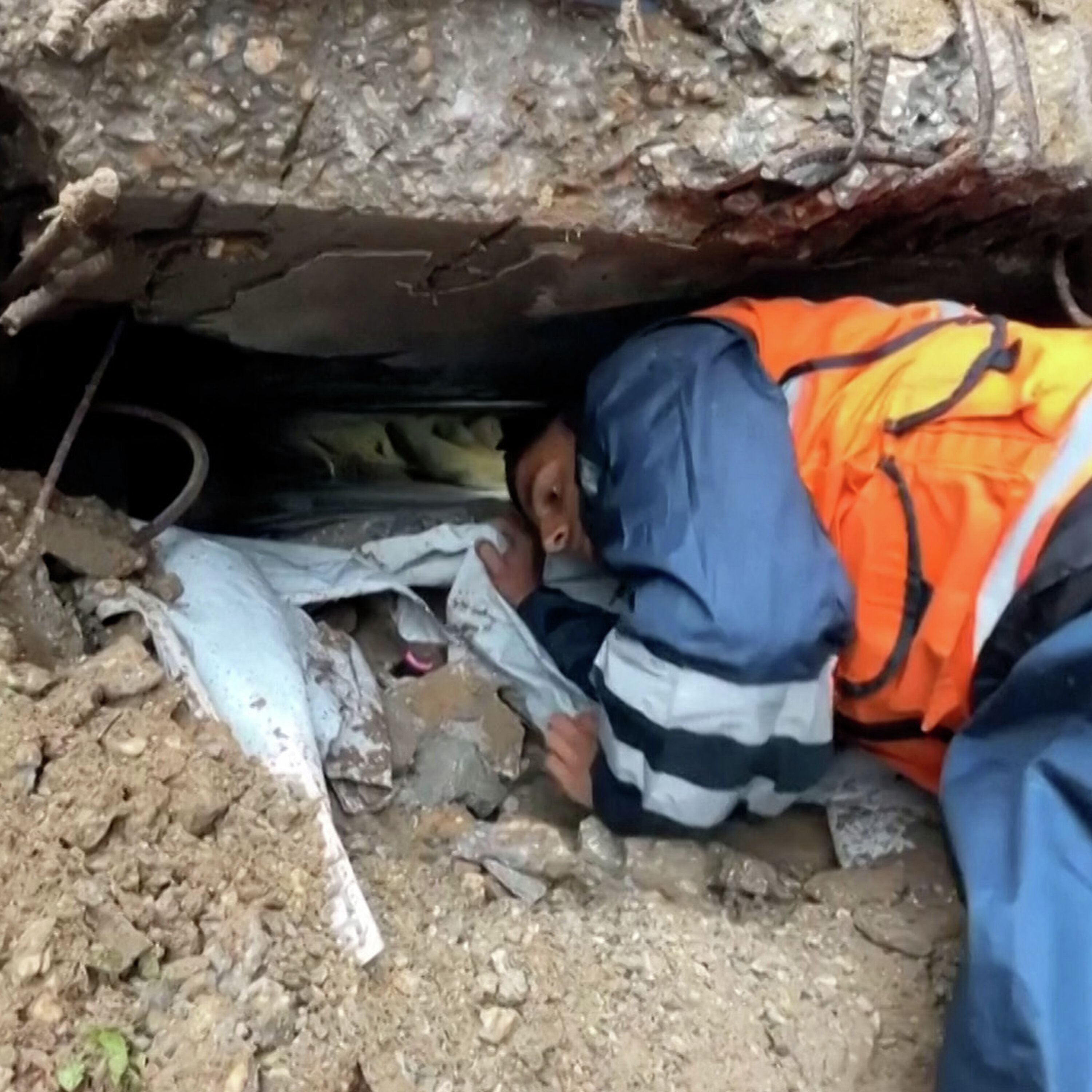 Rescuers in Gaza pull Palestinians out of buildings collapsed by Storm Byron Rescuers in Gaza pull Palestinians out of buildings collapsed by Storm Byron