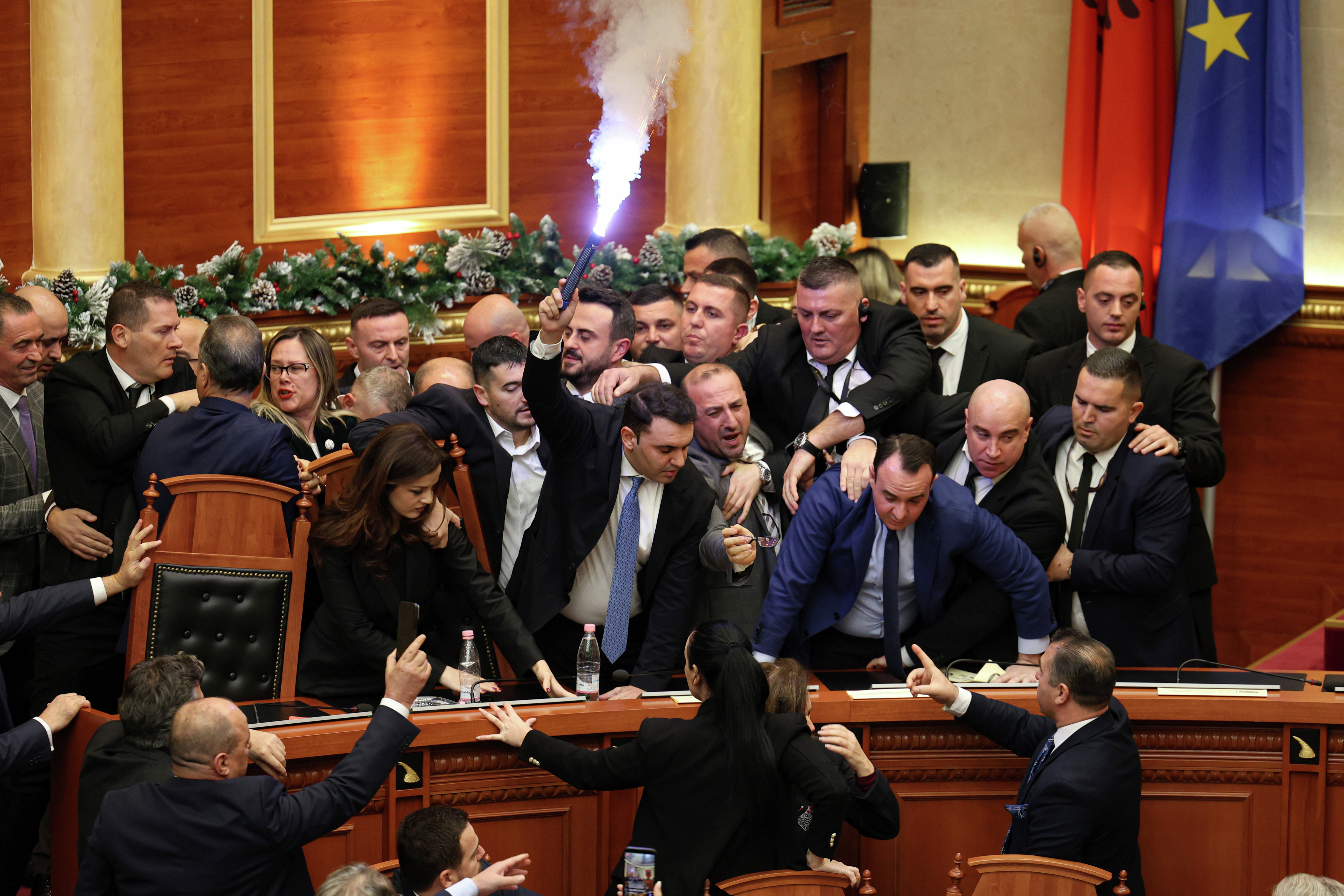Flare and fighting in Albanian parliament dispute