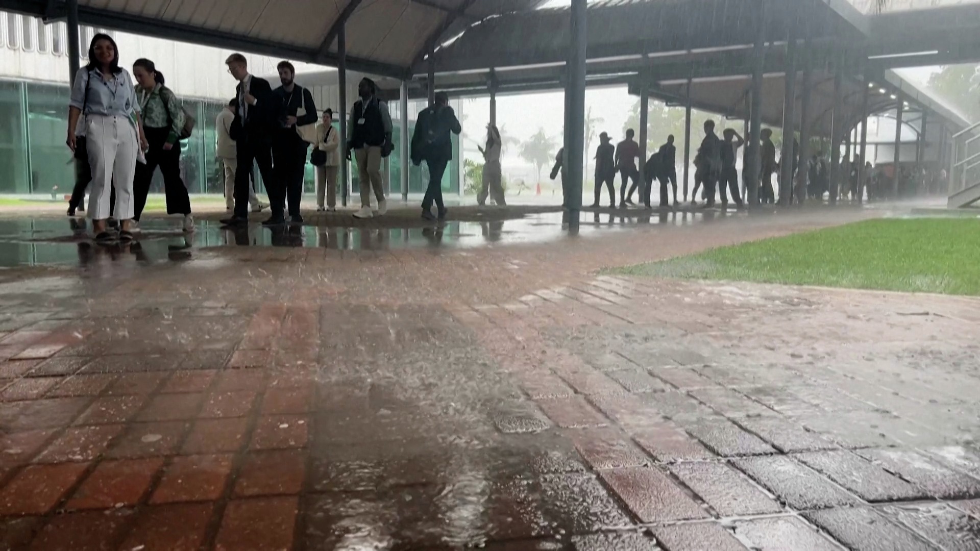 Heavy rains flood COP30 conference entrances