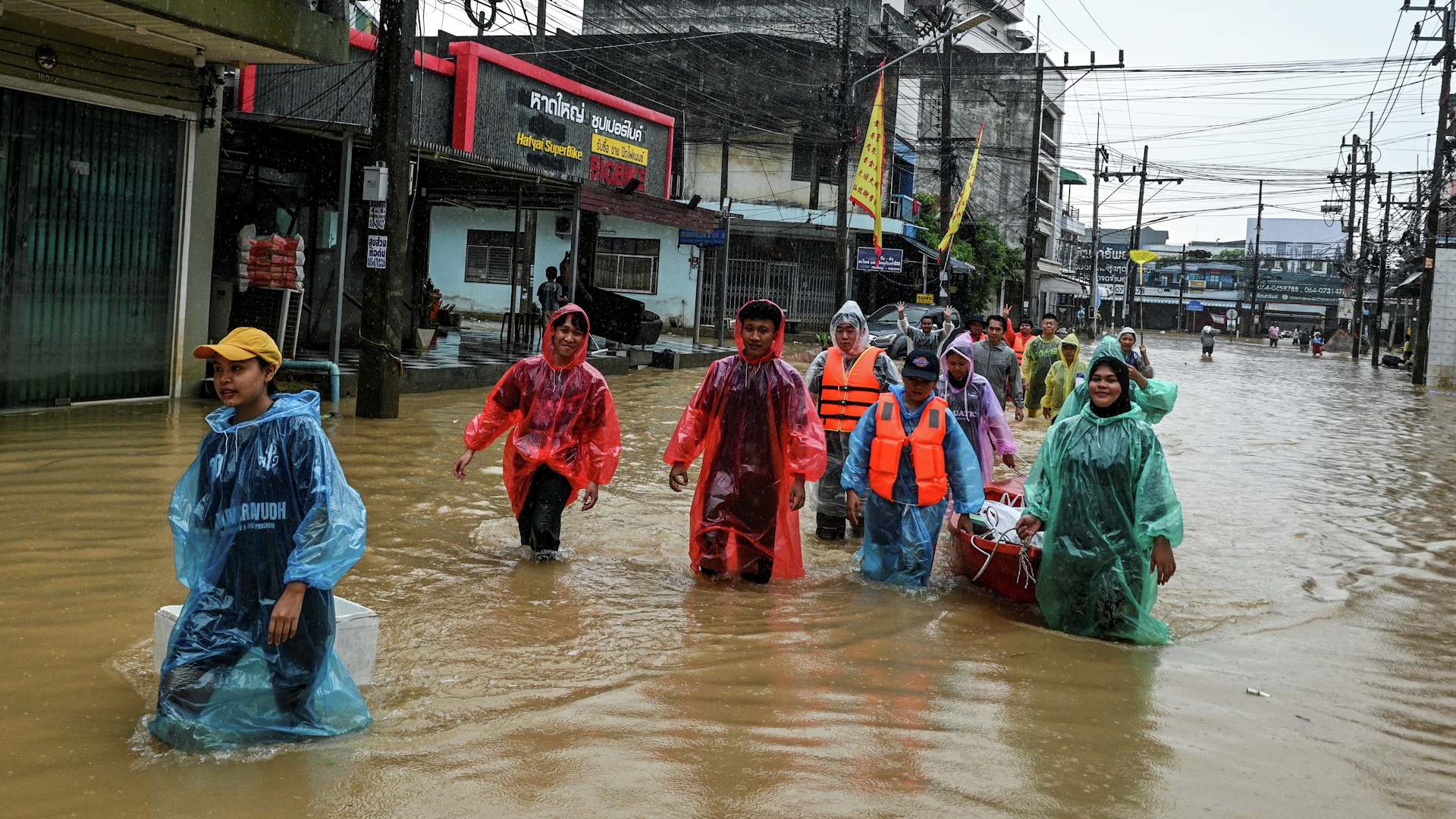 Deadly floods swamp homes in Thailand as residents wait for aid